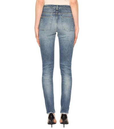 Shop Saint Laurent Distressed Skinny Jeans With Leather