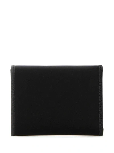 Prada Logo Plaque Wallet In Black