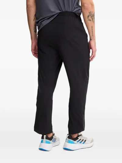 Asics Core Elasticated Logo Track Pants In Black