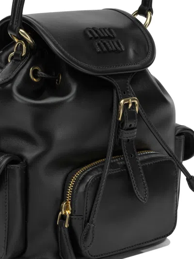 Miu Miu Flap Backpack In Black