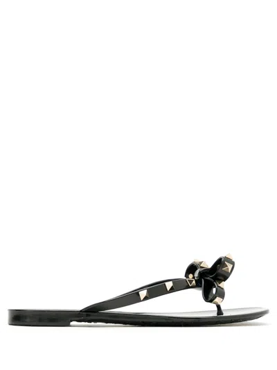 Valentino Garavani Mini Bow Sandals With Platinum-finish Studs In Black