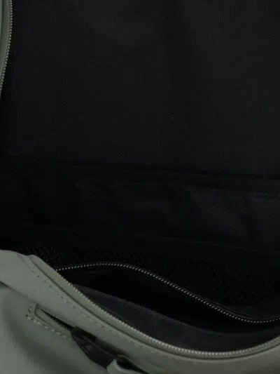 Rains Clip Front Backpack In Green