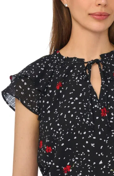 Cece Floral Dot Flutter Sleeve Split Neck Top In Black