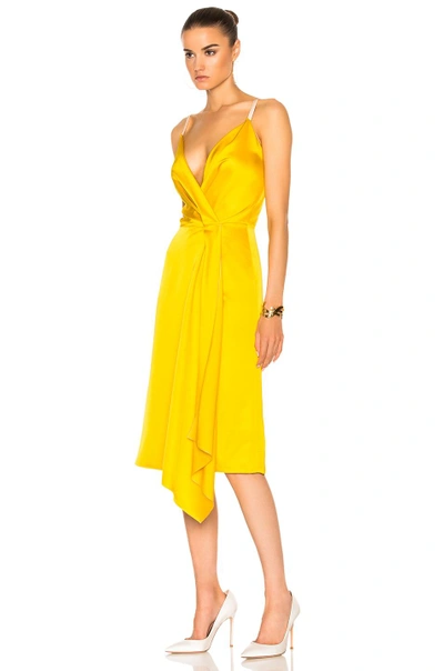 Shop Victoria Beckham Heavy Fluid Silk Wrap Dress In Yellow. In Yellow & Pale Rose