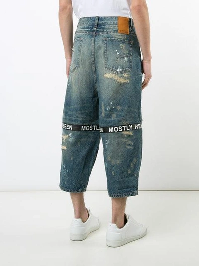 Shop Mostly Heard Rarely Seen Distressed Cropped Jeans In Blue