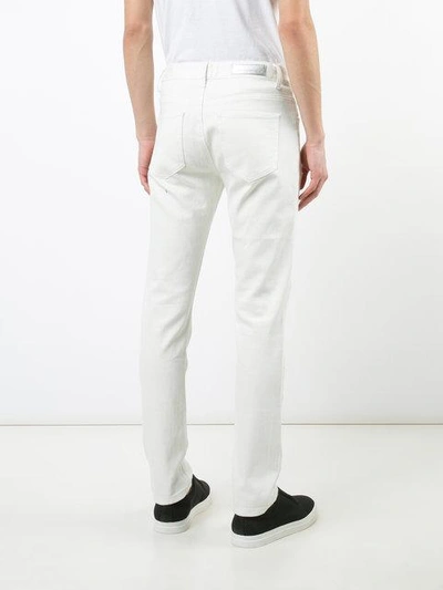 Shop God's Masterful Children Shredded Ribbed Trim Jeans In White