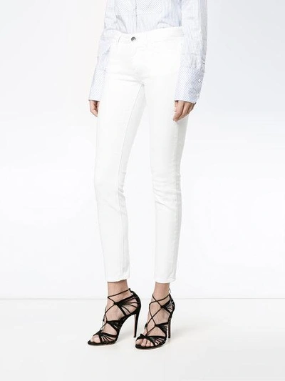 Shop Dolce & Gabbana Skinny-jeans Mit Ananas-applikation In White