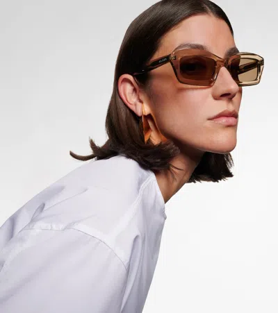 Alaïa Lettering Logo Rectangular Sunglasses In Brown