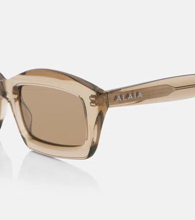 Alaïa Lettering Logo Rectangular Sunglasses In Brown