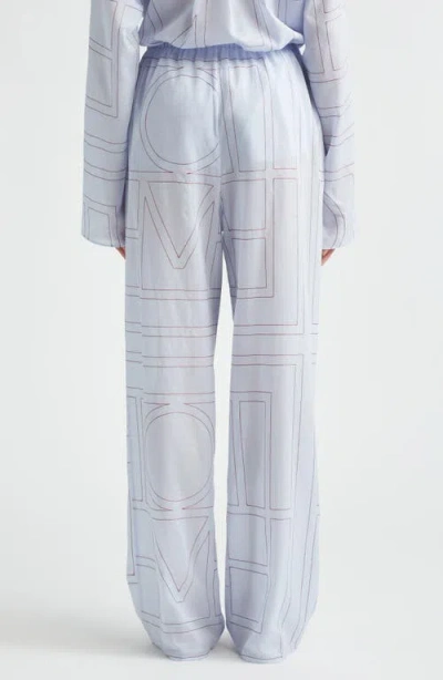 Totême Toteme Monogram Embroidered Pull-on Pants In Blue