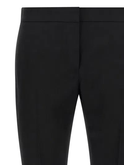 Alexander Mcqueen Pants Mcqueen Woman Color Black In Animal Print