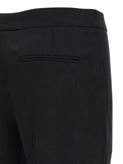 Alexander Mcqueen Pants Mcqueen Woman Color Black In Animal Print