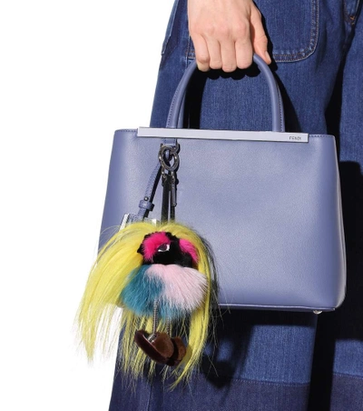 Shop Fendi Mini Zaino Monster Fur Charm In Giallo