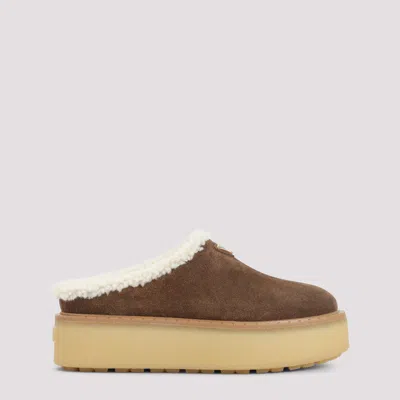 Prada Brown Suede Mules With Shearling Trim And Plush Lining In Blue
