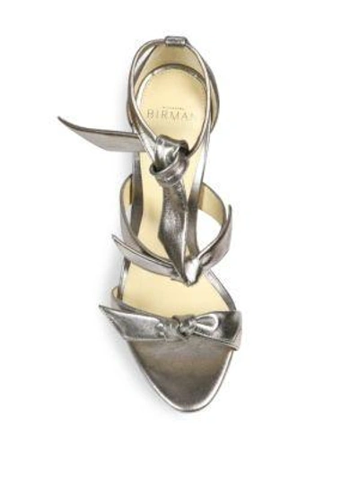 Shop Alexandre Birman Lolita Bow Metallic Leather Sandals In Limestone