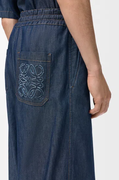 Loewe Drawstring Chambray Trousers In Blue