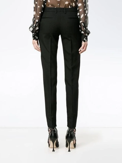 Shop Saint Laurent Gabardine Skinny Trousers In Black