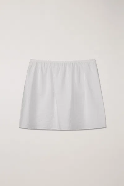 Dunst Cream Mini Skirt With Overlapping Panel In White