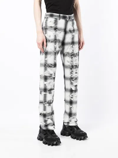 Givenchy Ripped Check Trousers In Multi