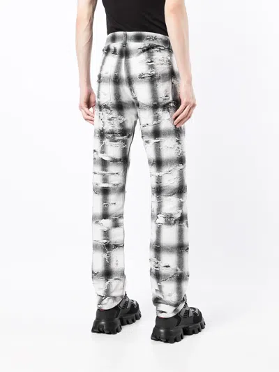 Givenchy Ripped Check Trousers In Multi