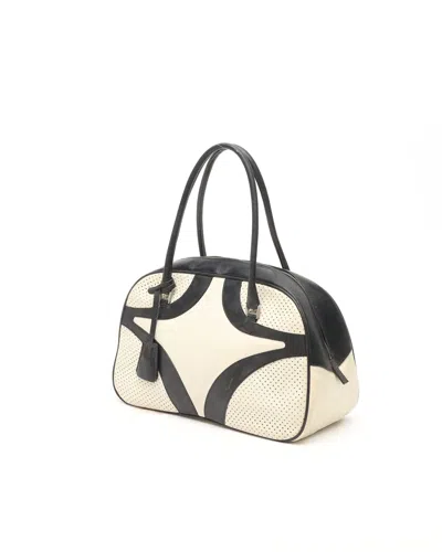 Prada Perforated Bowling Bag In Black