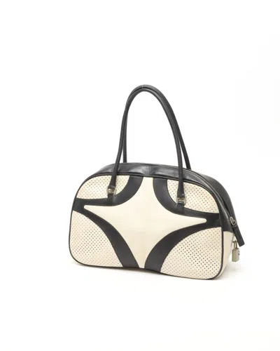 Prada Perforated Bowling Bag In Black