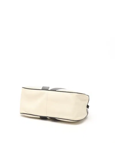 Prada Perforated Bowling Bag In Black