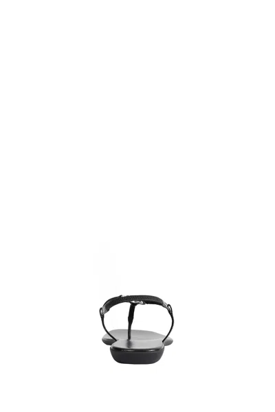 Gucci Interlocking G Leather Thong Sandals In Black