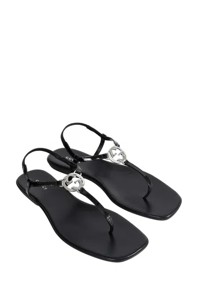 Gucci Interlocking G Leather Thong Sandals In Black