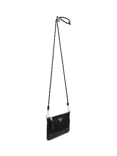 Prada Zippered Shoulder Bag In Black