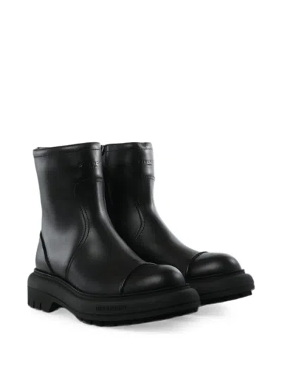 Givenchy Logo-embossed Leather Boots In Black