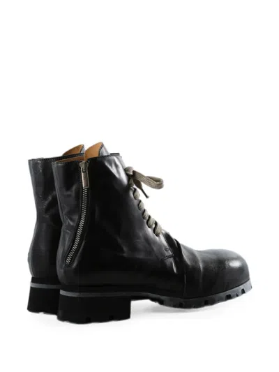 Givenchy Logo-embossed Leather Boots In Black