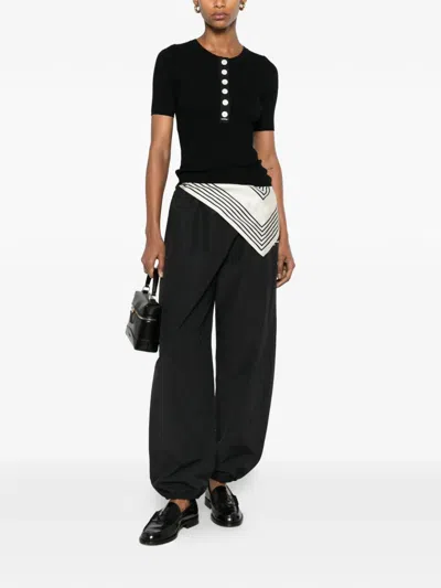 Sandro Ribbed-knit Button-placket Top In Black