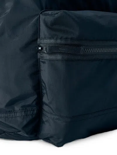 Stone Island Logo-patch Zip-pocket Backpack In Blue