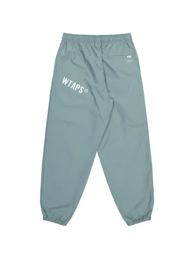 Wtaps Spst2001 Logo-print Track Pants In Blue
