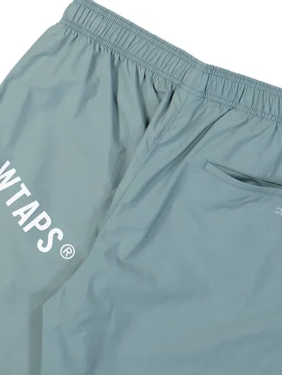 Wtaps Spst2001 Logo-print Track Pants In Blue
