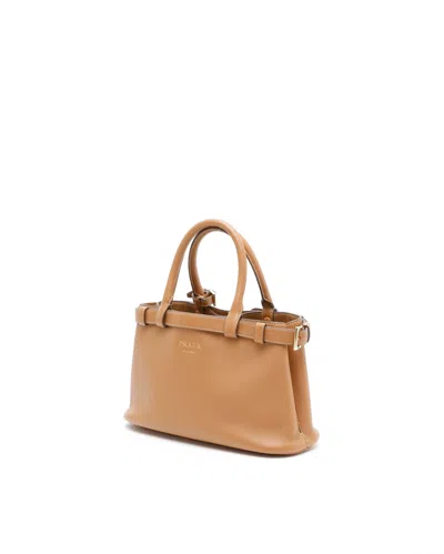 Prada Small Buckle Bag In Brown