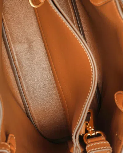 Prada Small Buckle Bag In Brown