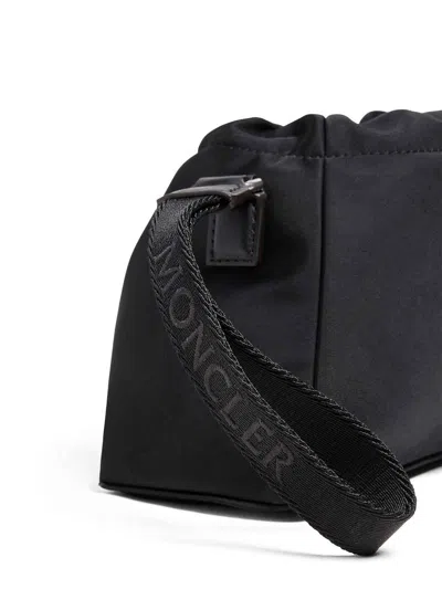 Moncler Compact Handheld Pouch Handbag With Logo Detail In Black