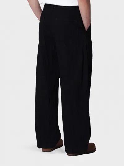 Studio Nicholson Jeans Men In Black