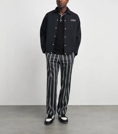 J. Lindeberg J Lindeberg 30y Devyn Stripe Golf Trousers In Black