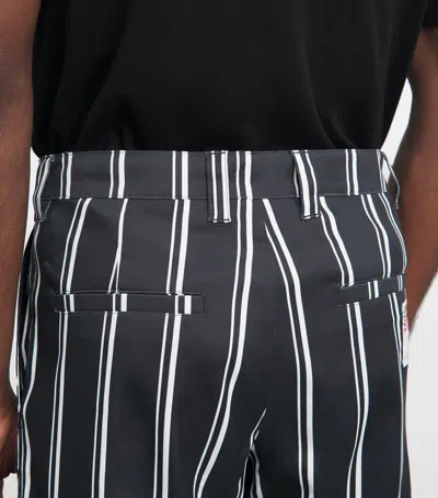 J. Lindeberg J Lindeberg 30y Devyn Stripe Golf Trousers In Black