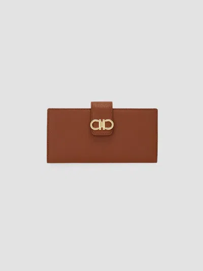 Ferragamo Grained Leather Continental Wallet In Brown