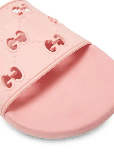 Pre-owned Gucci Embossed-logo Slides In Pink