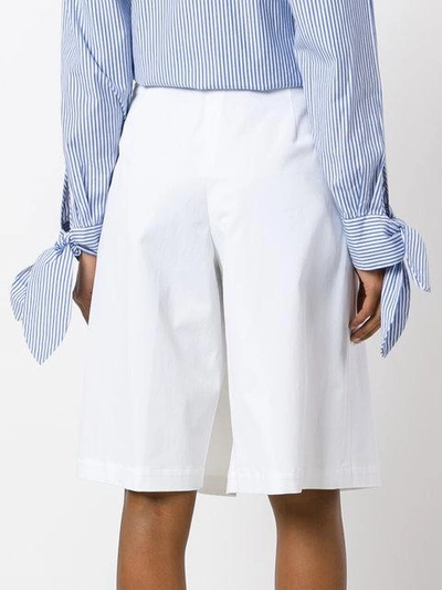 Shop Jil Sander Pleated Asymmetric Shorts
