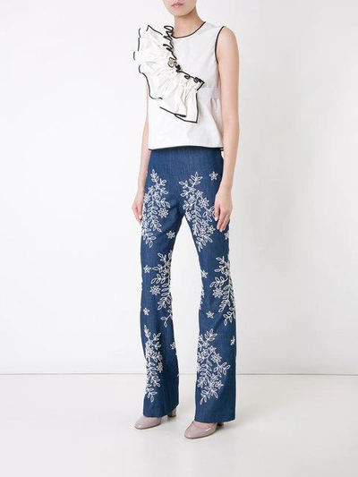Shop Huishan Zhang Embroidered Flared Jeans - Blue