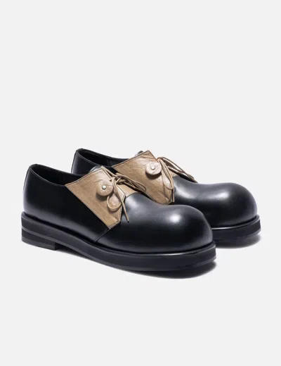 No Idea Foot Document Envelope Derby In Black