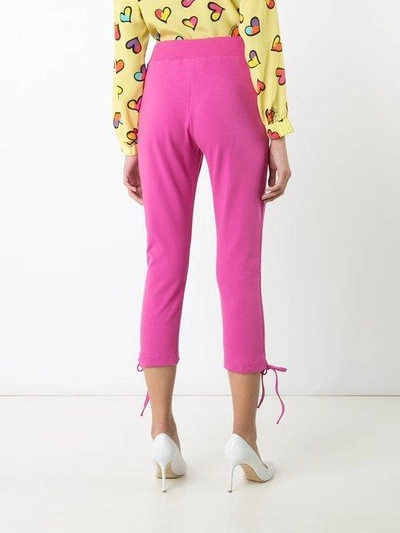 Shop Moschino Cropped Drawstring Pull Trousers - Pink