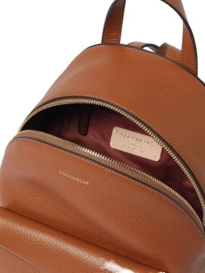 Coccinelle Flap-pocket Zip Backpack In Orange