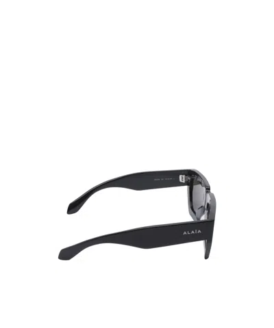 Alaïa Rectangular Frame Sunglasses In Black